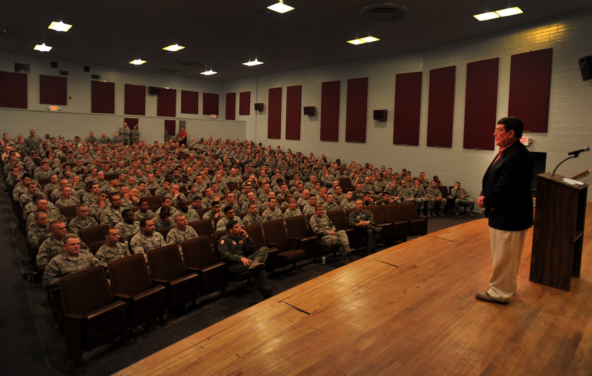 Jack Van Loan takes questions from Airmen at the base theater Sept. 27, 2011, Shaw Air Force Base, S.C. Van Loan was a prisoner of war in North Vietnam after he was shot down on May 20, 1967. Van Loan was held until his release on March 4, 1973. Van Loan was the guest speaker, and he spoke to Shaw members for Wingman Safety Day and highlighted the importance of being a good wingman. Van Loan also spoke of the ways he survived his approximately six years in captivity. One of the most important things he stressed was to have goals. He told Team Shaw successful leaders have goals. (U.S. Air Force photo by Senior Airman Kenny Holston/Released)


