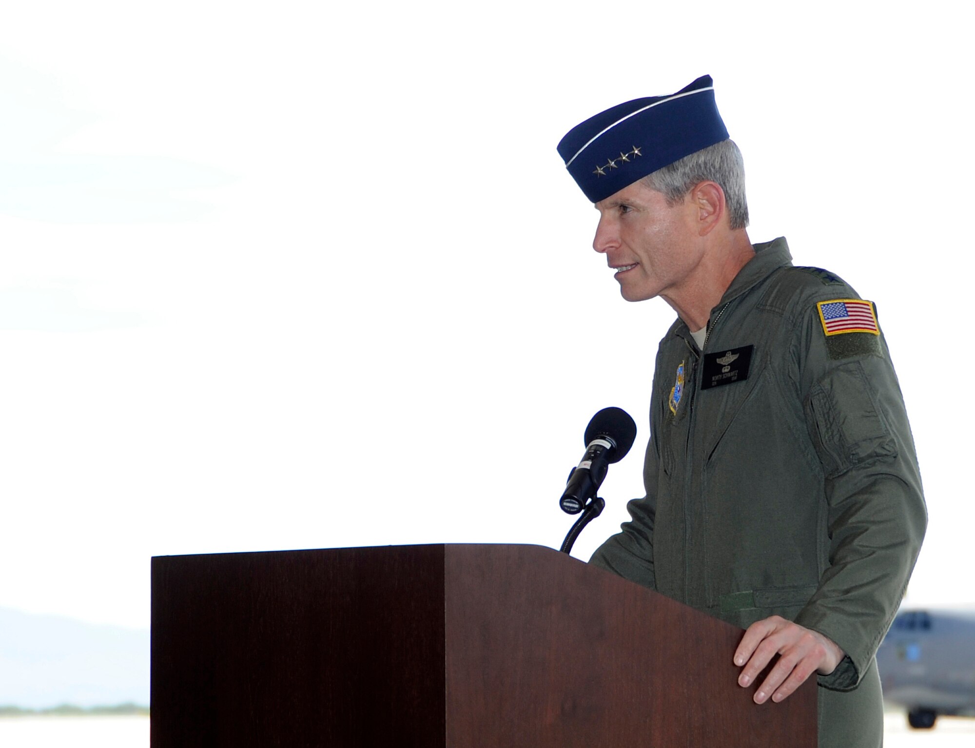 DAVIS-MONTHAN AIR FORCE BASE, Ariz. - Air Force Chief of Staff Gen. Norton Schwartz addresses the crowd at the HC-130J Combat King II arrival ceremony at Davis-Monthan Air Force Base, Ariz., on Sept. 24, 2011. The J-model will eventually replace the current HC-130s used by the Air Force for personnel recovery.  (U.S. Air Force photo/Tech. Sgt. Christopher A. Campbell)