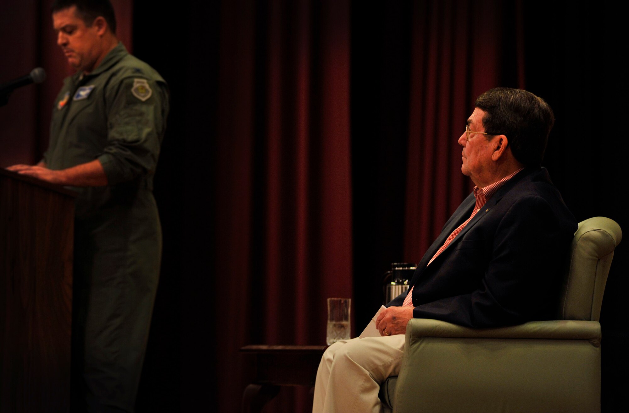 Jack Van Loan, a former prisoner of war, prepares to take the podium to speak about what it means to be a wingman, Sept. 27, 2011, Shaw Air Force Base, S.C. Loan was held in captivity for approximately six years in North Vietnam after he was shot down on May 20, 1967. Van Loan was held until his release on March 4, 1973.  Van Loan was the guest speaker, and he spoke to Shaw members for Wingman Safety Day and highlighted the importance of being a good wingman. Van Loan also talked about facing a person?s deepest fear and how he was able to conquer his during captivity to survive. (U.S. Air Force photo by Senior Airman Kenny Holston/Released)


