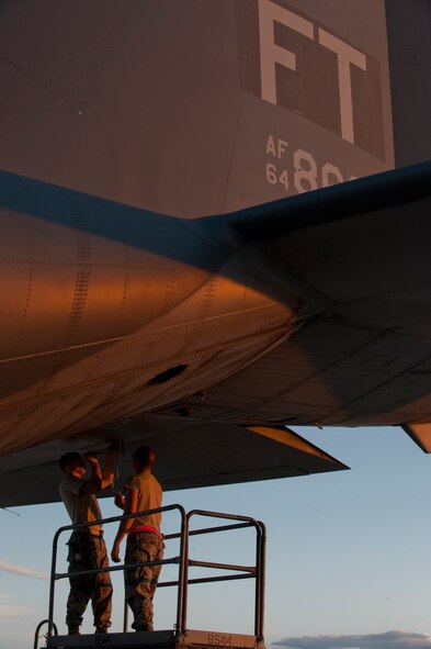 Maintainers with the 563rd Rescue Group perform last minute maintenance on a HC-130P Combat King prior to a night-time operation training mission at Davis-Monthan Air Force Base, Az. on Sept. 23, 2011. The Combat King which is attached to the 79th Rescue Squadron, routinely trains with its sister squadrons, 48th and 55th Rescue Squadrons, to emulate its real world missions while in deployed locations. (U.S. Air Force photo by Staff Sgt. Joshua J. Garcia/Released)