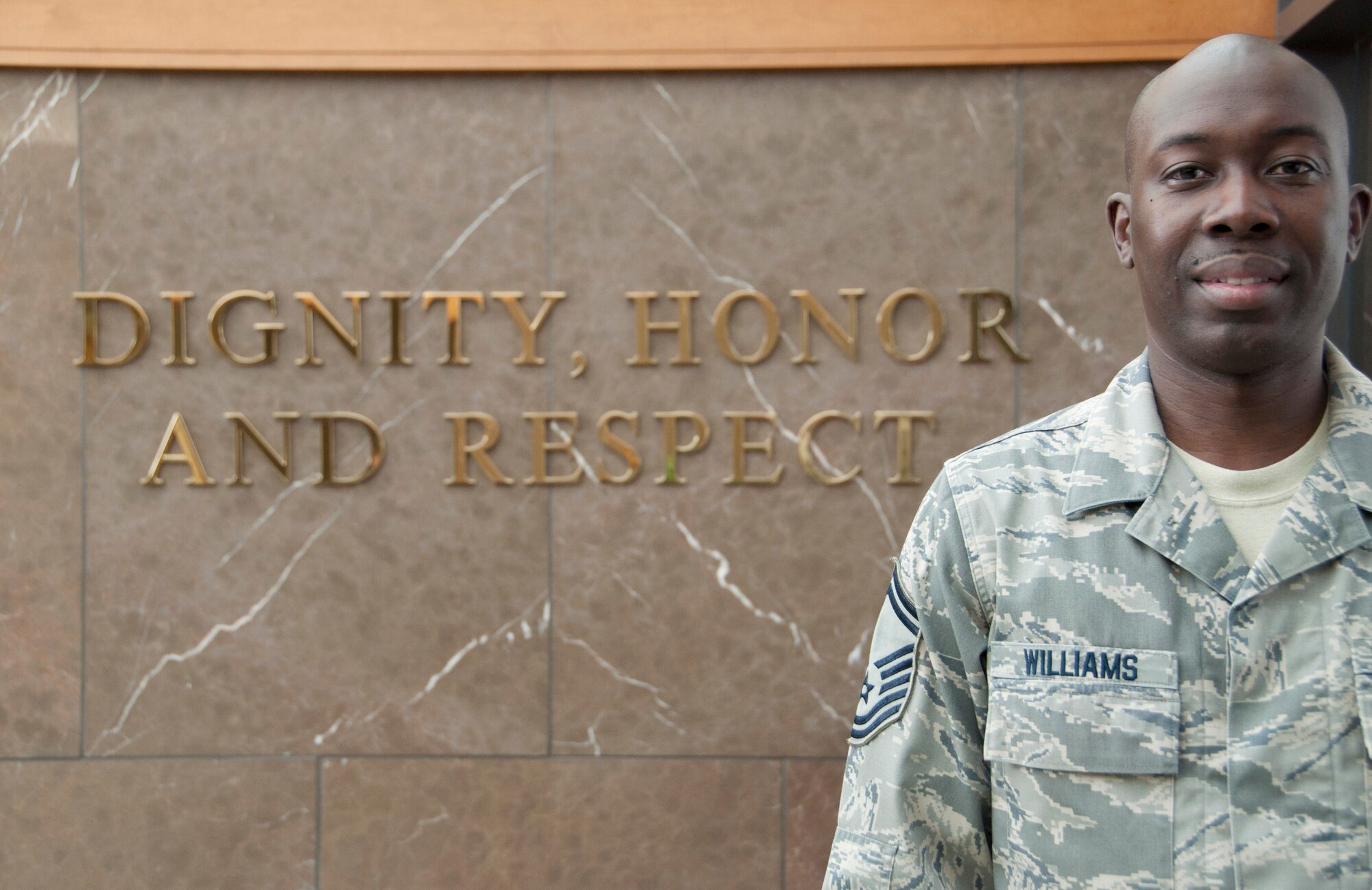 Senior Master Sgt. Tyrone Williams, Port Mortuary Division superintendent, poses inside the Charles C. Carson Center for Mortuary Affairs Sept. 27, 2011. Williams has supported the mission of providing dignity, honor and respect to fallen service members while assigned to Air Force Mortuary Affairs Operations. (U.S. Air Force photo/Tech. Sgt. Marvin Moore)