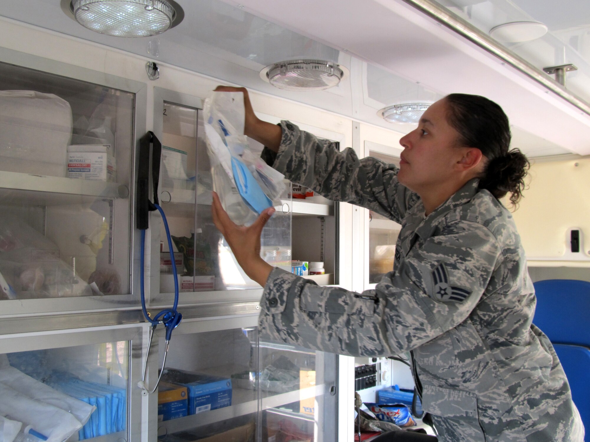 Senior Airman (SrA) Luz Rivera, an aerospace medical technician with the Texas Air National Guard?s 149th Fighter Wing at Lackland Air Force Base, Texas, prepares an ambulance before training operations begin at the Texas Air National Guard?s 204th Security Forces Squadron at Fort Bliss, Texas; Sept. 13, 2011. (Air National Guard photo by Staff Sgt. Phil Fountain/Released)