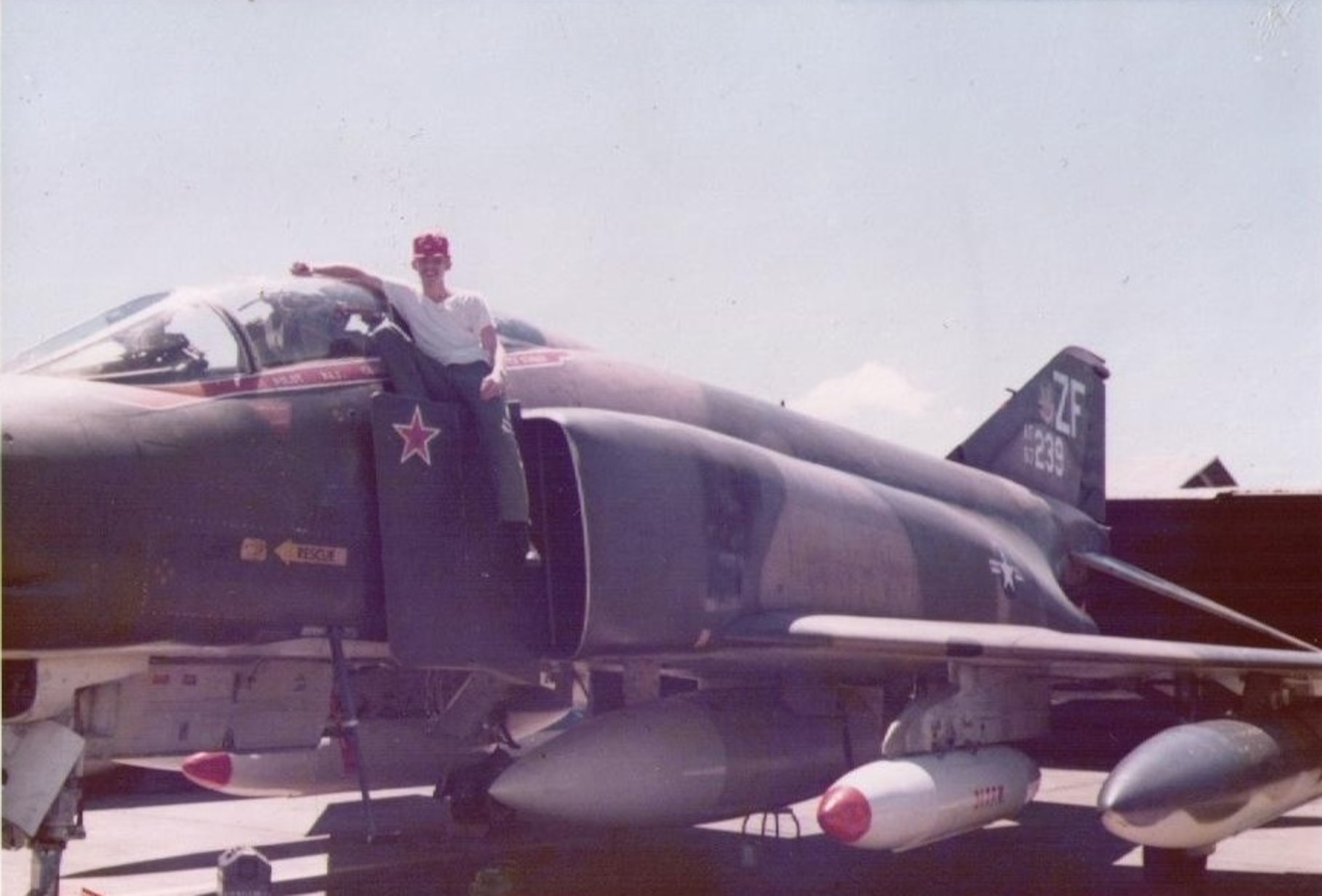 Airman William Pook poses with a “MiG Killer” F-4 Phantom while assigned to the 307th Tactical Fighter Squadron at Udorn Royal Thai Air Force Base, Thailand, in 1972. Pook earned the Vietnam Gallantry Cross for “heroism and gallantry in combat against enemy forces” during an attack on the base Oct. 3, 1972. Pook, a reservist assigned to the 633rd Civil Engineer Squadron at Langley Air Force Base, Va., retired as a master sergeant on Sept. 23, 2011, after 40 years of service in the Air Force. (Courtesy photo/William Pook)
