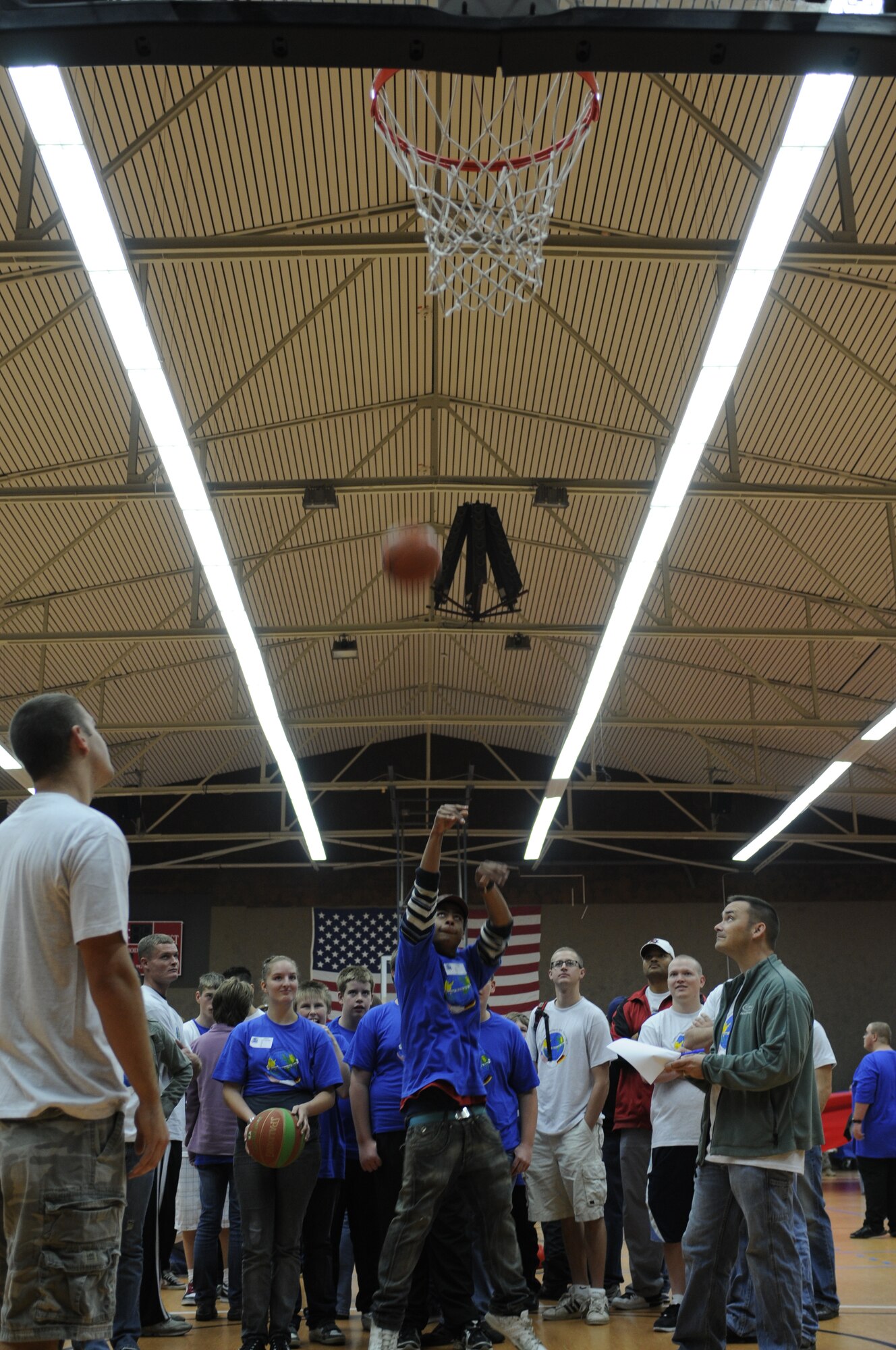 SPANGDAHLEM AIR BASE, Germany  --  Amin Lawal shoots a free-throw during St. Martin’s Special Children’s Day Sept. 22 at the Skelton Memorial Fitness Center. Lawal is a student from Bitburg’s St. Martin’s School who participated in the day’s events with Airmen who volunteered to be buddies.  Airmen partnered up with children like Lawal for a day of activities hosted by the air base. This is the 16th year Spangdahlem AB has hosted the German and American partnership building event with the Bitburg school. (U.S. Air Force photo/Senior Airman Natasha E. Stannard)
