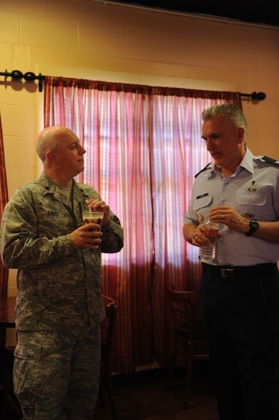 Col. Gregory Tate, Air Combat Command chaplain, talks with Lt. Col. Boyd Short, 7th Bomb Wing Wing Chaplain, as they enjoy milkshakes prepared by Airmen at the Soul Fire Café, Sept, 24, 2011, at Dyess Air Force Base Texas.  Tate is visiting Dyess to meet with senior leadership and to lead different services at the base chapel. (U.S. Air Force photo by Airman 1st Class Cierra Bullock/Released) 