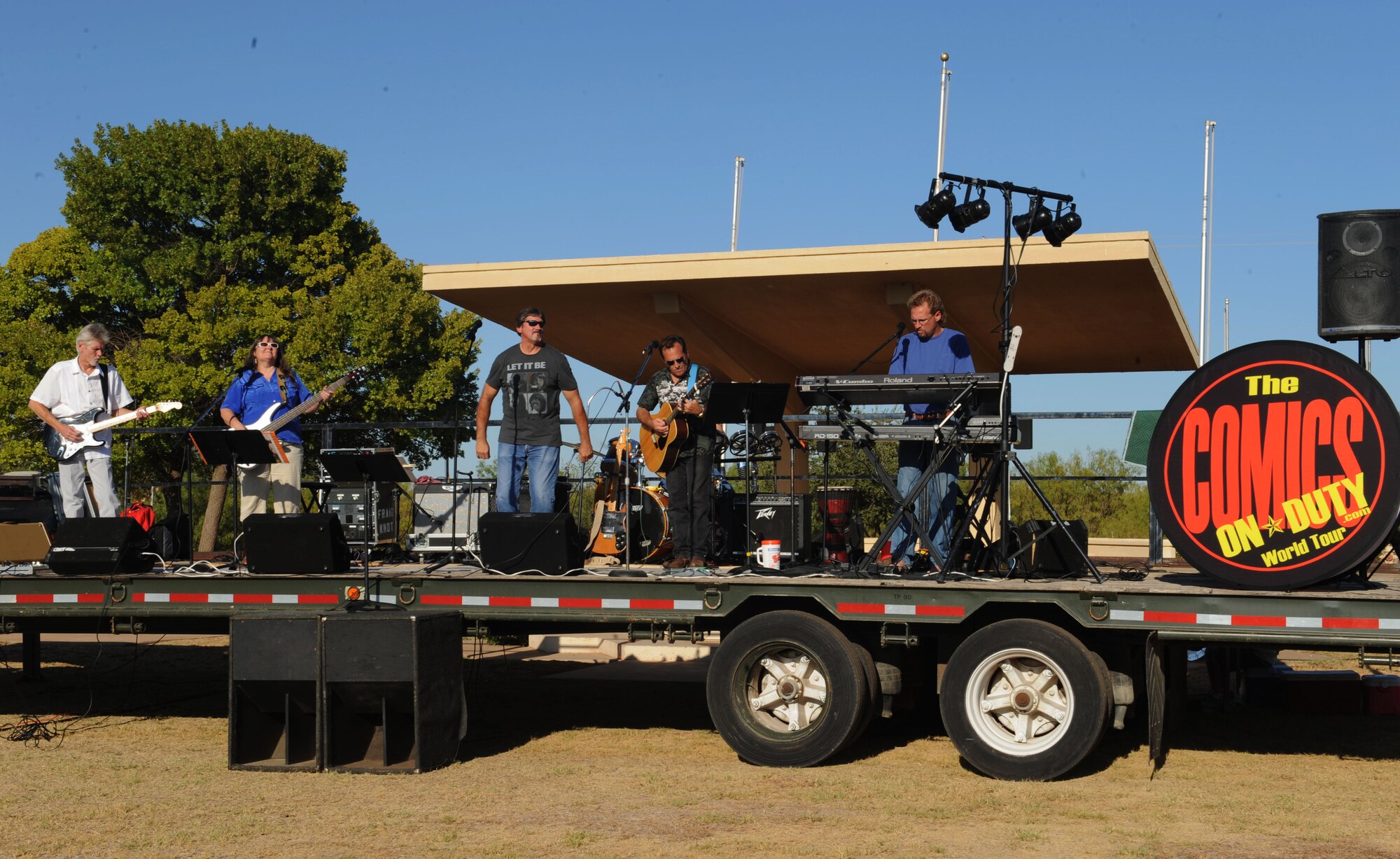 A local band, Fraid Knot, performs for an audience at Comedy Under the Stars, Sept. 23, 2011, at Dyess Air Force Base, Texas. The band regularly performs at the Service Members Club here once a month. (U.S. Air Force photo by Airman 1st Class Cierra Bullock/Released)