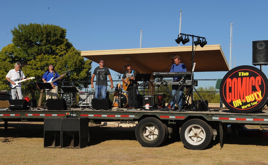 A local band, Fraid Knot, performs for an audience at Comedy Under the Stars, Sept. 23, 2011, at Dyess Air Force Base, Texas. The band regularly performs at the Service Members Club here once a month. (U.S. Air Force photo by Airman 1st Class Cierra Bullock/Released)