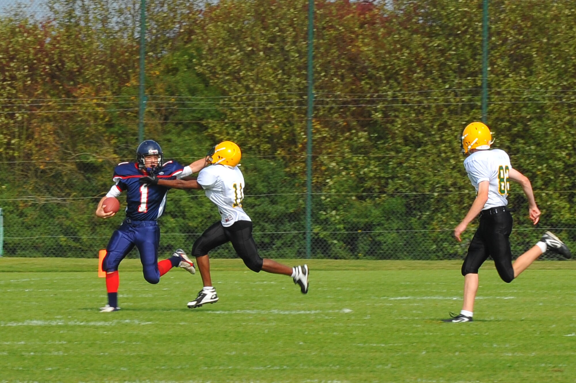 BITBURG ANNEX, Germany – Evan Less, number 1, Bitburg High School Barons special teams, returns the ball during a kickoff at the Bitburg High School homecoming football game here Sept. 24. The Bitburg Barons defeated the S.H.A.P.E. Sultans 56-20. (U.S. Air Force photo/Airman 1st Class Dillon Davis)