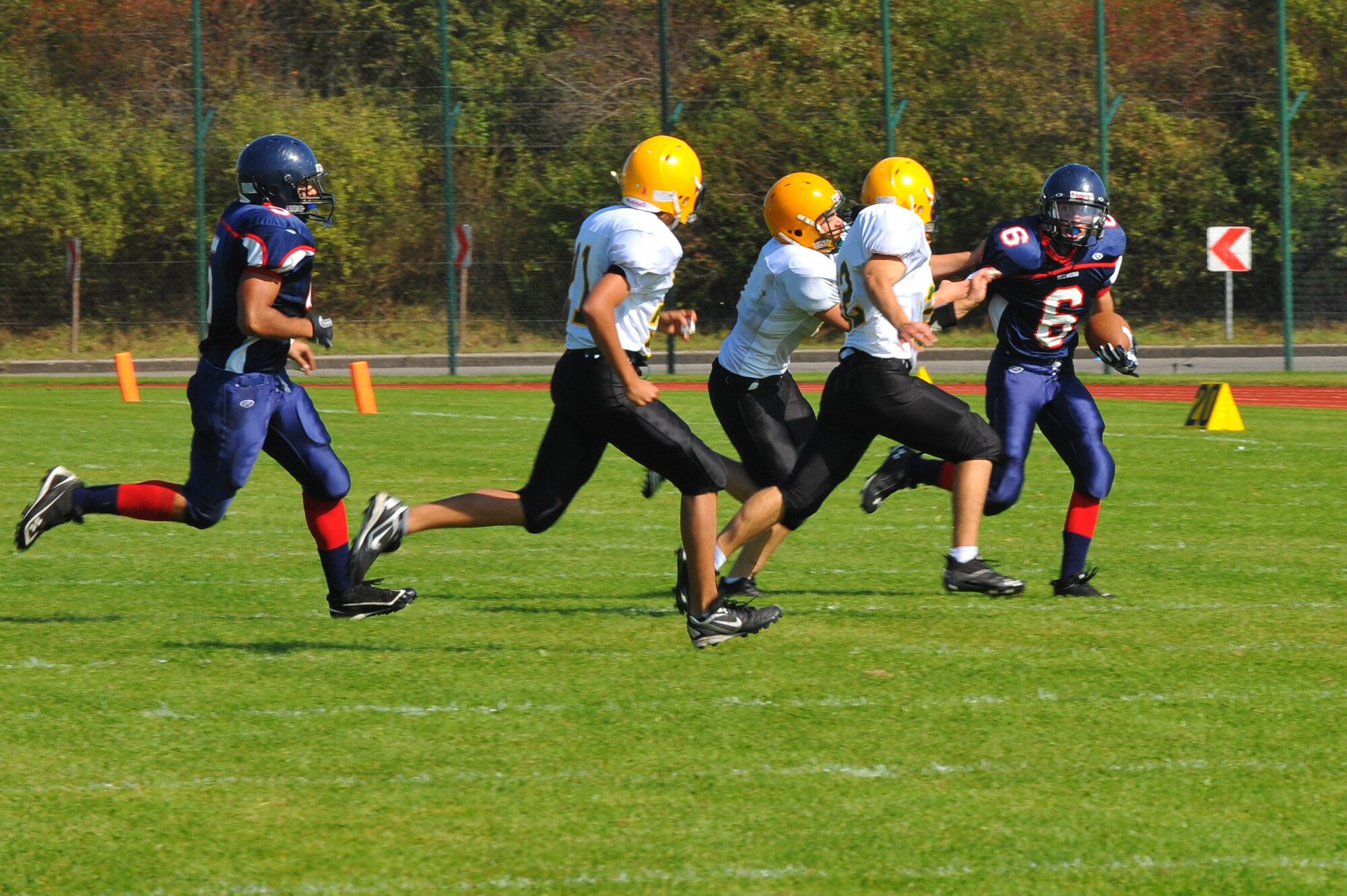BITBURG ANNEX, Germany – Matt Flood, number 6, Bitburg High School Barons running back, carries the ball for a first down during the Bitburg High School homecoming football game here Sept. 24. The Bitburg Barons defeated the S.H.A.P.E. Sultans 56-20. (U.S. Air Force photo/Airman 1st Class Dillon Davis)