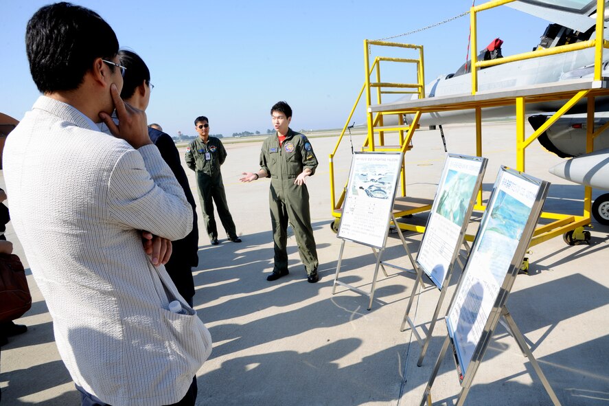 KUNSAN AIR BASE, Republic of Korea -- Members of the Republic of Korea Air Force briefs Wonkwang University Medical Center and Gunsan Medical Center executive leadership teams about their KF-16 Fighting Falcons here Sept 24. Wonkwang University and Gunsan Medical Center’s leadership teams were invited by the 8th Medical Group commander and leadership to tour the base. The Wonkwang University and Gunsan Medical Centers are Kunsan AB’s referral hospitals of choice nearby who provide specialty care to Wolf Pack members when it is not available at the 8th MDG clinic. (U.S. Air Force photo/Staff Sgt. Rasheen A. Douglas)