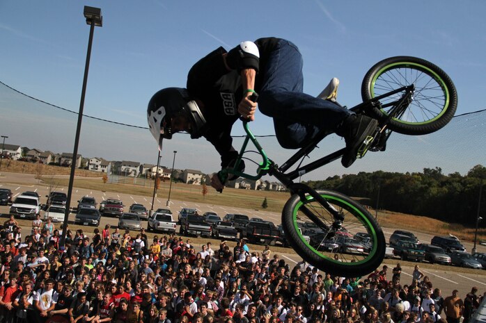 BMX biker Jimmy Walker prepares for his next trick on a state-of-the-art pro half-pipe during the Shakopee, Minn., stop of the 2011 ASA Fall High School Tour Sept. 28. Hundreds of students attended the event, which was sponsored by the United States Marine Corps. For additional imagery from the event, visit www.facebook.com/rstwincities.