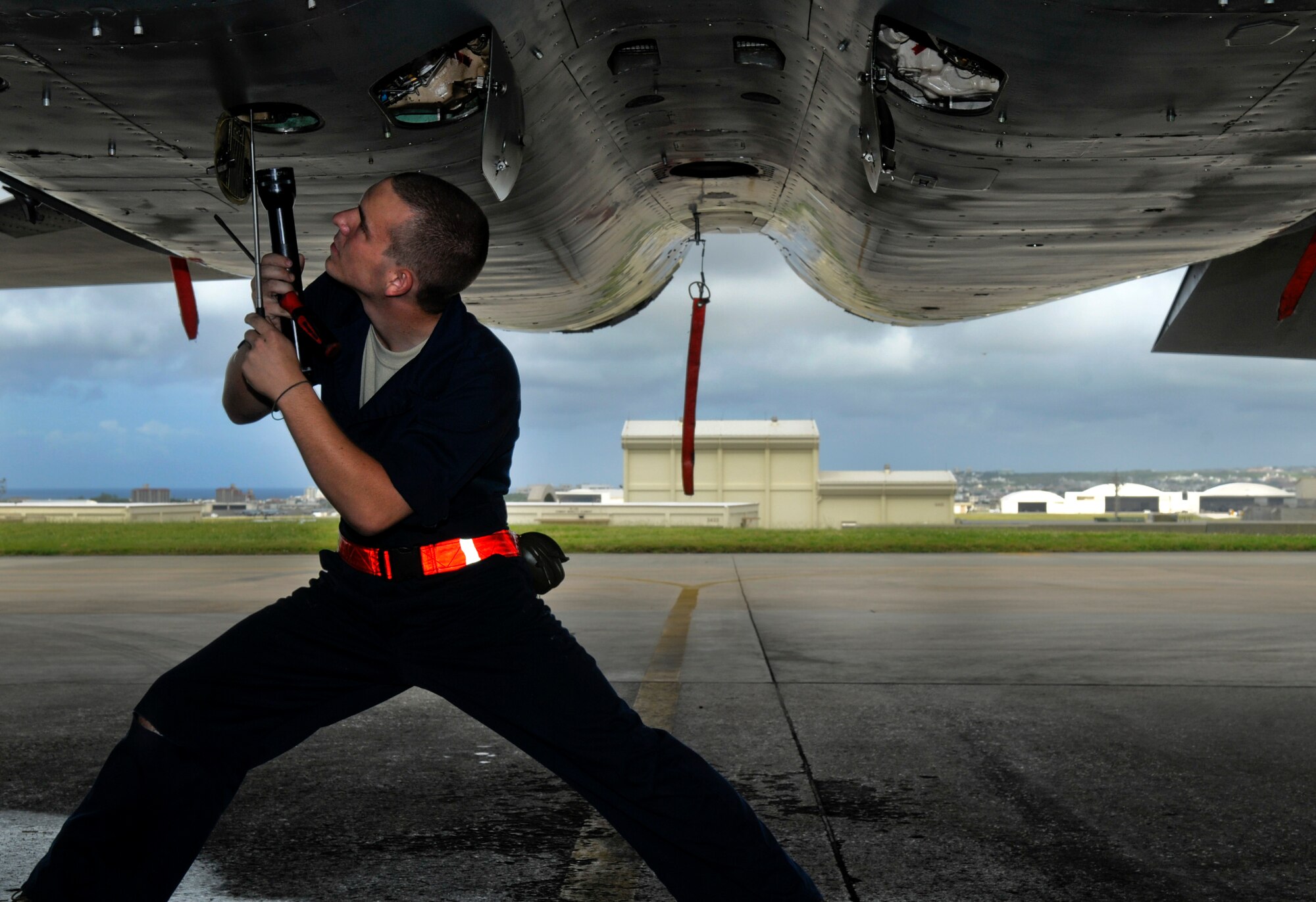 Airman 1st Class Christoph Tanner, 18th Aircraft Maintenance Squadron crew chief, checks oil servicing on an F-15 Eagle fighter jet as part of a post-flight inspection on Kadena Air Base, Japan, Sept. 26. Without the Airmen from the 18th Aircraft Maintenance Squadron performing fuel support, unscheduled maintenance when parts malfunction and inspections from pre-flight to post-flight, there's no guarantee the jets would even get off the ground. (U.S. Air Force photo/ Airman 1st Class Maeson L. Elleman)
