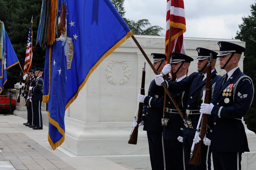 The U.S. Air Force Honor Guard color team presents the colors at the Tomb of the Unknown Soldier Sept. 27, Arlington, Va., prior to a wreath laying. The ceremony was in honor of the Nigerian Air Force; presented by Air Marshal Mohammed Dikko Umar, Chief of the Air Staff, Nigerian Air Force. (U.S. Air Force photo by Staff Sgt. Christopher Ruano)