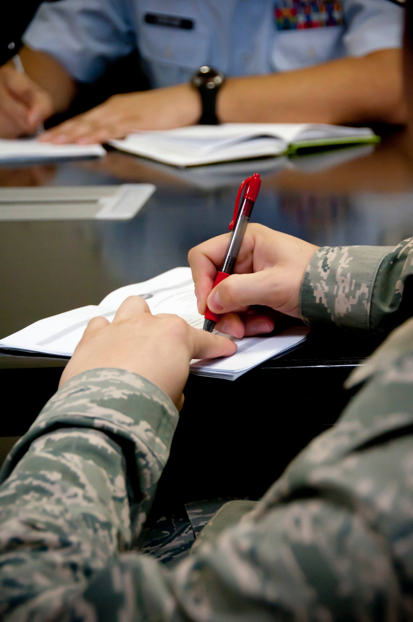 YOKOTA AIR BASE, Japan -- Tech Sgt. Randy Barkalow, 374th Maintenance Squadron aerospace propulsion craftsman, takes notes during a leadership course at Yokota Air Base, Japan, Sept. 26, 2011. Barkalow participated in a five-day course based upon the 360 Degree Leader program, which teaches the principles of leading an organization from all levels. (U.S. Air Force photo/Airman 1st Class Krystal M. Garrett)
