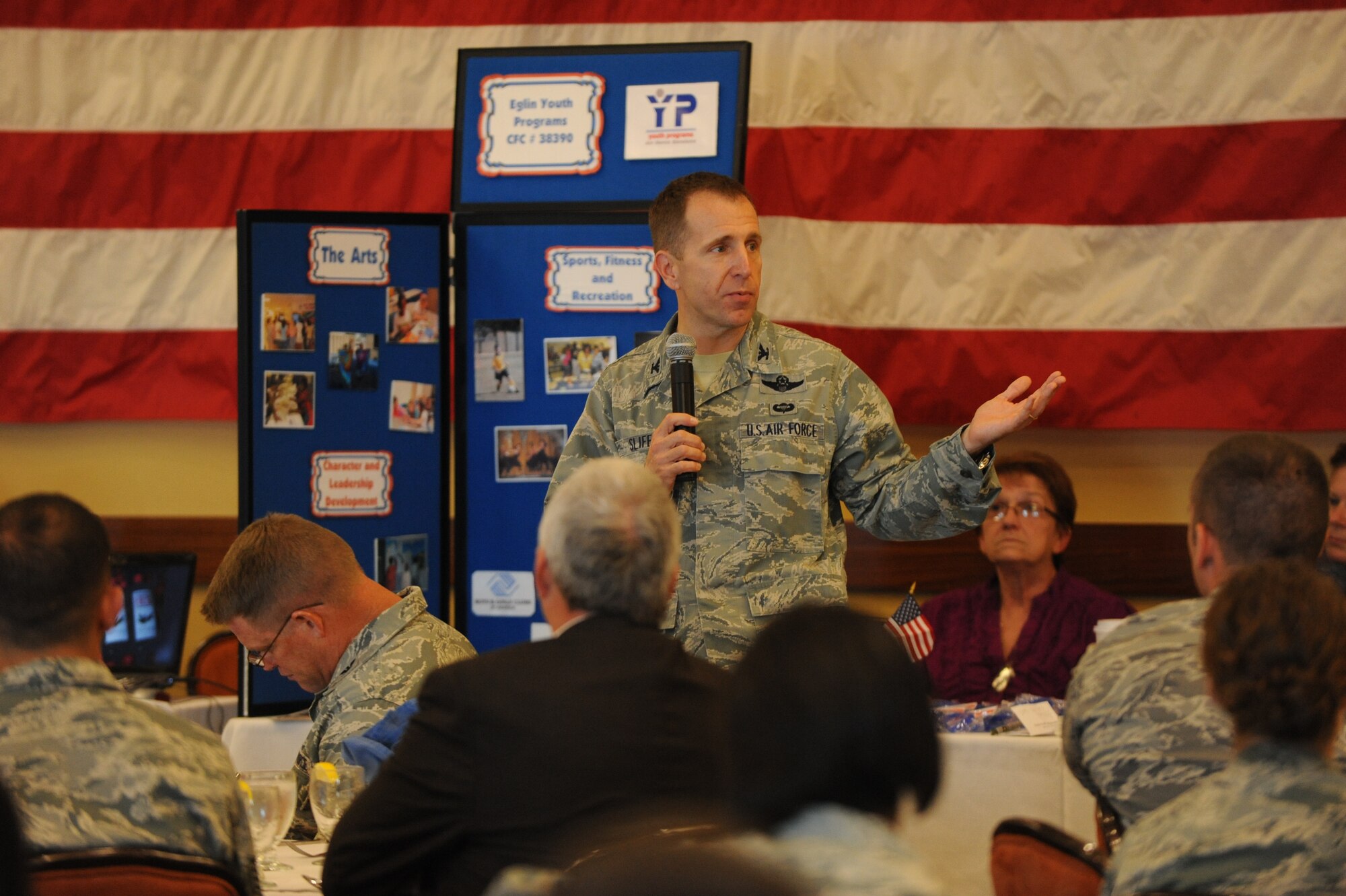 Col. James Slife, commander of the 1st Special Operations Wing, speaks at the 2011 Combined Federal Campaign kick-off event at the Soundside club, Hurlburt Field, Fla., Sept. 27. This year marks the 50th anniversary of the CFC. (U.S. Air Force photo/Senior Airman Eboni Reams)(RELEASED)


