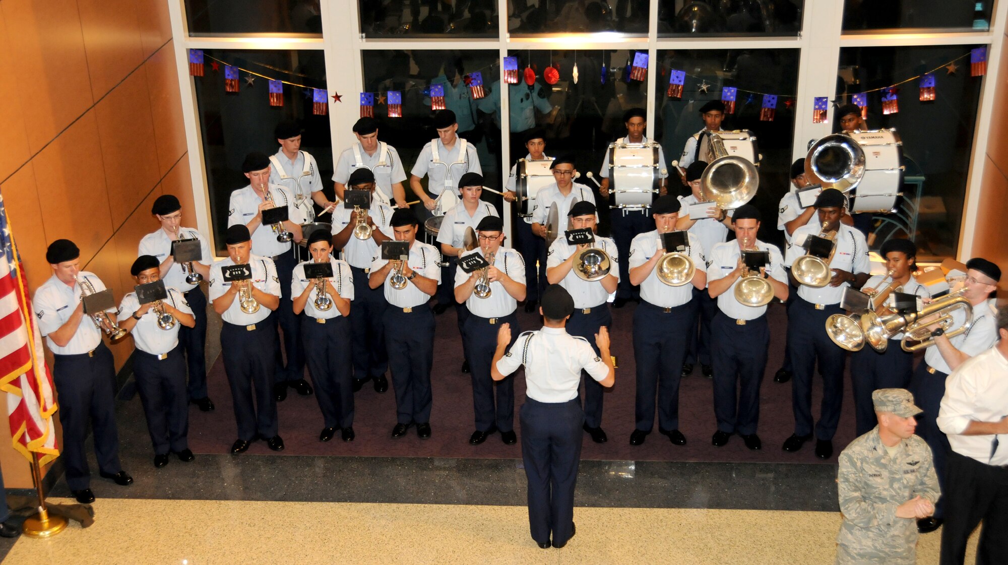 The Keesler Drum and Bugle Corps performs at Gulfport-Biloxi International Airport to
laud the return of the Honor Flight from Washington, D.C. Sept. 21.  (U.S. Air Force photo by Kemberly Groue)