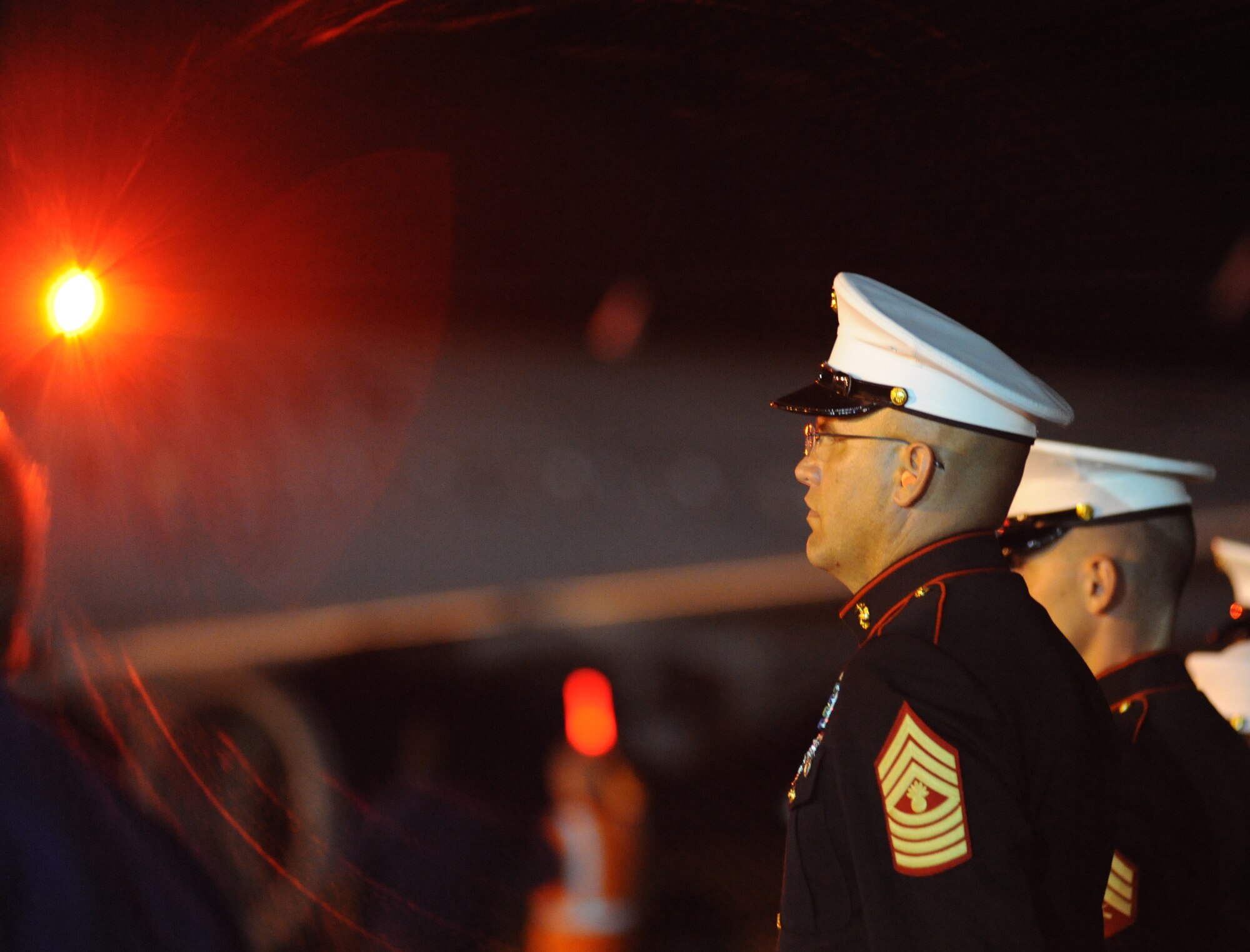 Master Gunnery Sgt. Kevin Wood lines up on the tarmac with other members of Keesler’s Marine Corps Detachment to greet returning members of the Mississippi Gulf Coast’s second Honor Flight Sept. 21 at the Gulfport-Biloxi International Airport. The 86 World War II veterans visited the World War II Memorial and other Washington, D.C. landmarks and met with Mississippi Sen. Roger Wicker and Rep. Steven Palazzo. Keesler’s 50-flag team, drum and bugle corps, honor guard and others welcomed the returning veterans.  (U.S. Air Force photo by Kemberly Groue)