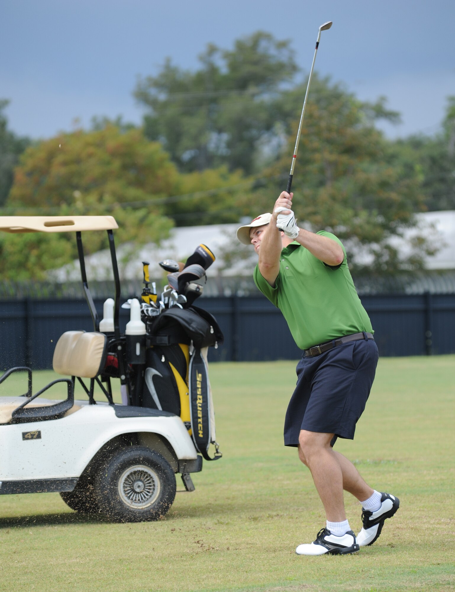 Duff Wier takes a swing on Hole 4 for the 81st Logistics Readiness Squadron, Sept. 21.  The 81st Force Support Squadron defeated the 81st LRS to win the base intramural golf title.  (U.S. Air Force photo by Kemberly Groue)