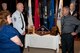 Chief Master Sgt. Andy Kaiser, Air Mobility Command command chief, and his wife Debbie tours the Uniform Section with William Zwicharowski, Port Mortuary branch chief, during their visit to Air Force Mortuary Affairs Operations, Dover Air Force Base, Del. Sept. 26, 2011. AFMAO was one of several stops during their tour of AMC bases. (U.S. Air Force photo/Tech. Sgt. Marvin Moore)