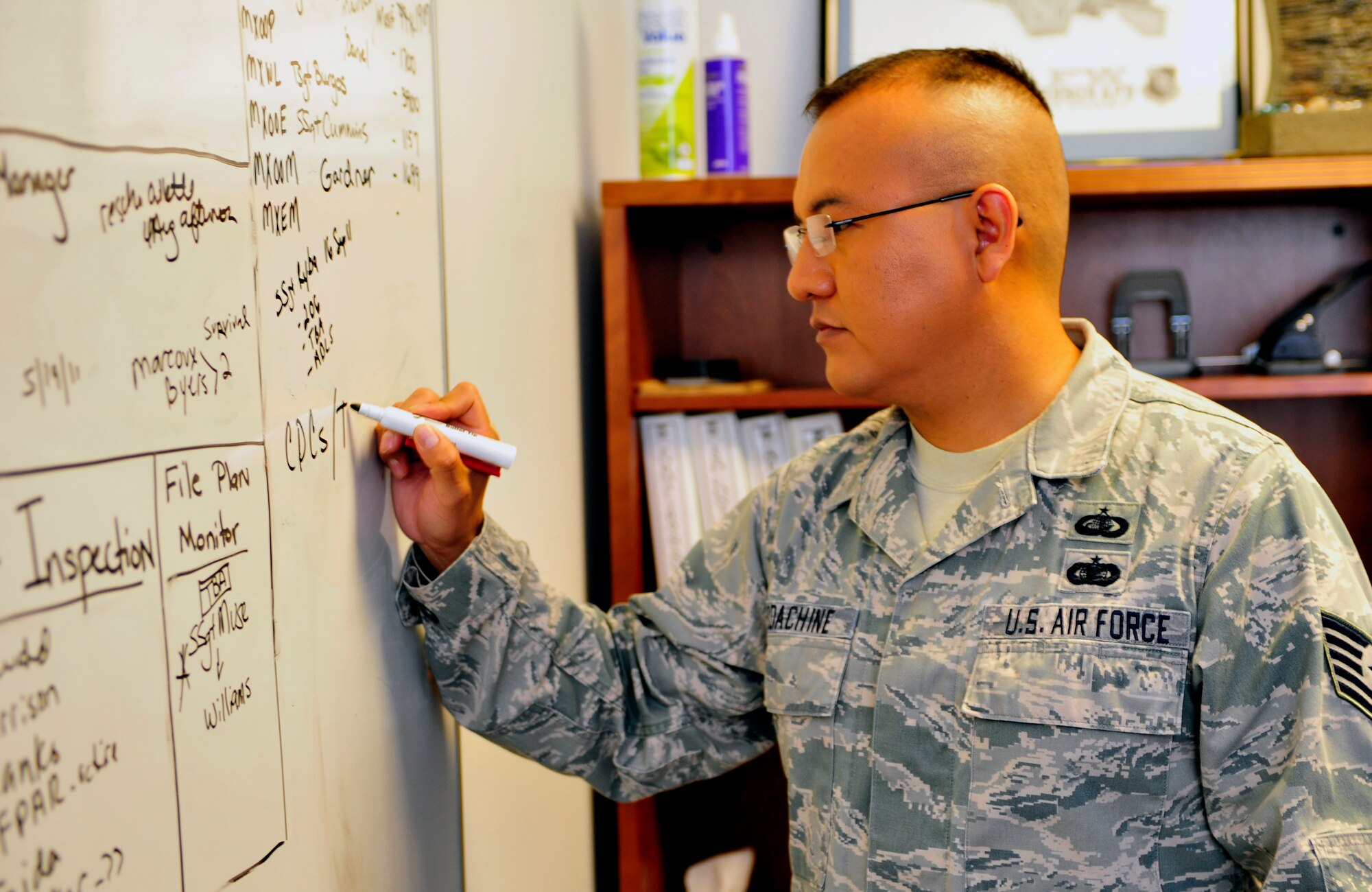 Tech. Sgt. Terry Todachine, 20th Maintenance Operations Squadron ancillary and formal trainer, jots down notes on his white board at Shaw Air Force Base, S.C., Sept. 28, 2011. He helps maintainers through several refesher courses throughout their careers. Todachine is the Warrior of the Week for the week of September 26 through 30. (U.S. Air Force photo/Airman 1st Class Daniel Phelps/Released)