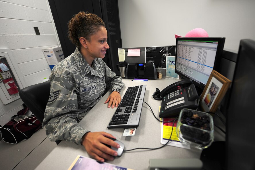 Staff Sgt. Sherry Santiago-Class works to correct a customer?s computer issue at the 4th Communications Squadron Consolidated Support Center (CSC) Seymour Johnson Air Force Base, N.C., Sept. 27, 2011. Many of the tickets submitted from the 4th Communications Squadron Communication Focal Point end up in the CSC where technicians work to fix them. In a week, the 10 technicians at the CSC complete approximately 150 trouble tickets. Santiago-Class is a native of Brooklyn, N.Y. (U.S. Air Force photo by Senior Airman Rae Perry)