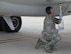 Senior Airman Sam Miller, 932nd Maintenance Squadron, collects excess fuel from VC-9 (tail 1863) just prior to its final flight as an Air Force Reserve aircraft.   (U.S. Air Force photo/Tech. Sgt. Dan Oliver)
