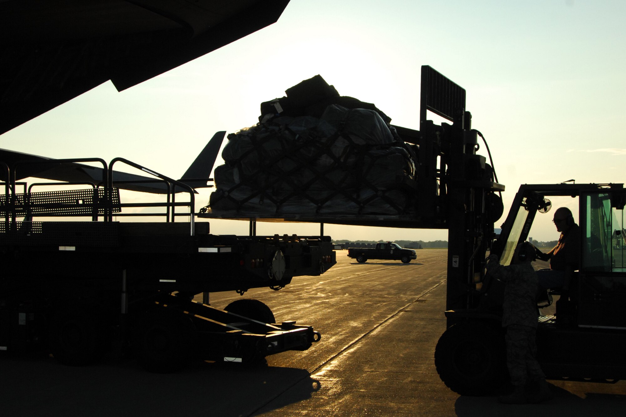 Approximately 200,000 pounds of cargo was shipped to Afghanistan from Selfridge Air National Guard Base, Mich., on several C-17 Globemaster III aircraft in late September. The cargo is supporting a deployment of approximately 300 members of theMichigan Air National Guard. Loading the C-17s lasted well into the evening hours of Sept. 24, 2011. (U.S. Air Force photo by John S. Swanson)
