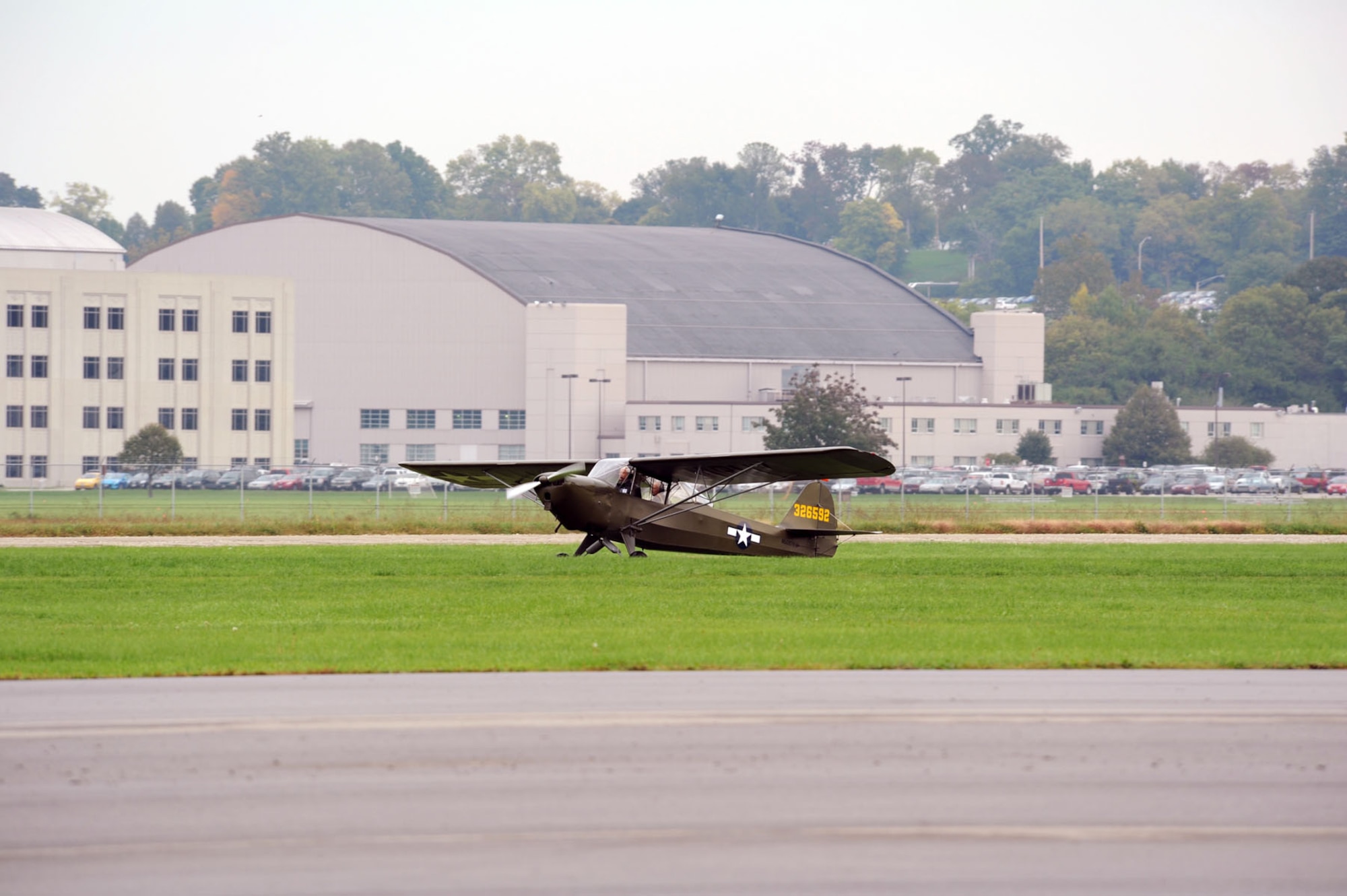 DAYTON, Ohio -- An L-2M that was used at the U.S. Army Air Forces Liaison Pilot Training School during World War II was flown to the National Museum of the U.S. Air Force on Sept. 28, 2011. The pilot of the aircraft's final flight, Dick Valladao, completed the restoration of the aircraft to its original Army specifications and donated it to the museum. (U.S. Air Force photo by Jeff Fisher)