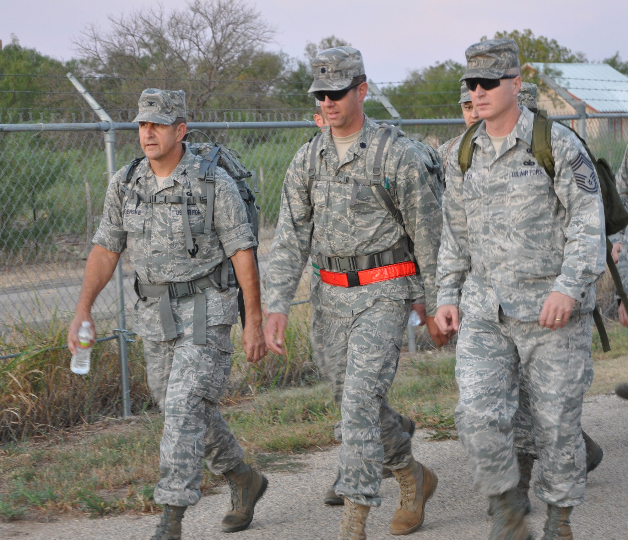 GOODFELLOW AIR FORCE BASE, Texas – (From left:) Col. Paul Bugenske, 17th Mission Support Group Commander, Lt. Col. Jeffrey McBride, 17th MSG Deputy Commander, and Chief Master Sgt. Quinton Otto, 17th MSG Superintendent, lead a flight down the base’s east perimeter during the Jacobson Memorial March Sept. 28. The march was in honor of security forces member Airman 1st Class Elizabeth Jacobson, and marked the sixth anniversary of her death.  Jacobson was the first security forces member and the first Air Force female to be killed in action in Operation Iraqi Freedom in 2005 by a roadside bomb. (U.S. Air Force photo/Connie Hempel)