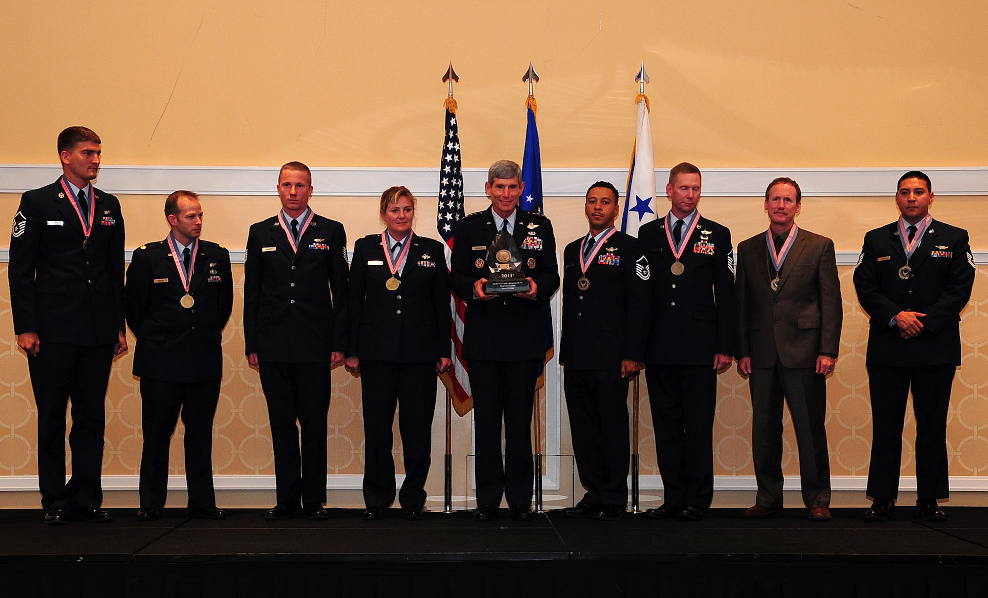 Members of the Total Force team comprised of members from 19 and 2nd Space Operations Squadron, Space and Missile Systems Center’s Global Positioning System Directorate, and supporting contractors stand with Air Force Chief of Staff, General Norton Schwartz, Sept. 20. after receiving the Chief of Staff Team Excellence Award for their work in executing the launch of the first GPS IIF last year. The award was presented during the Air Force Association’s Air and Space Conference in Washington, DC.