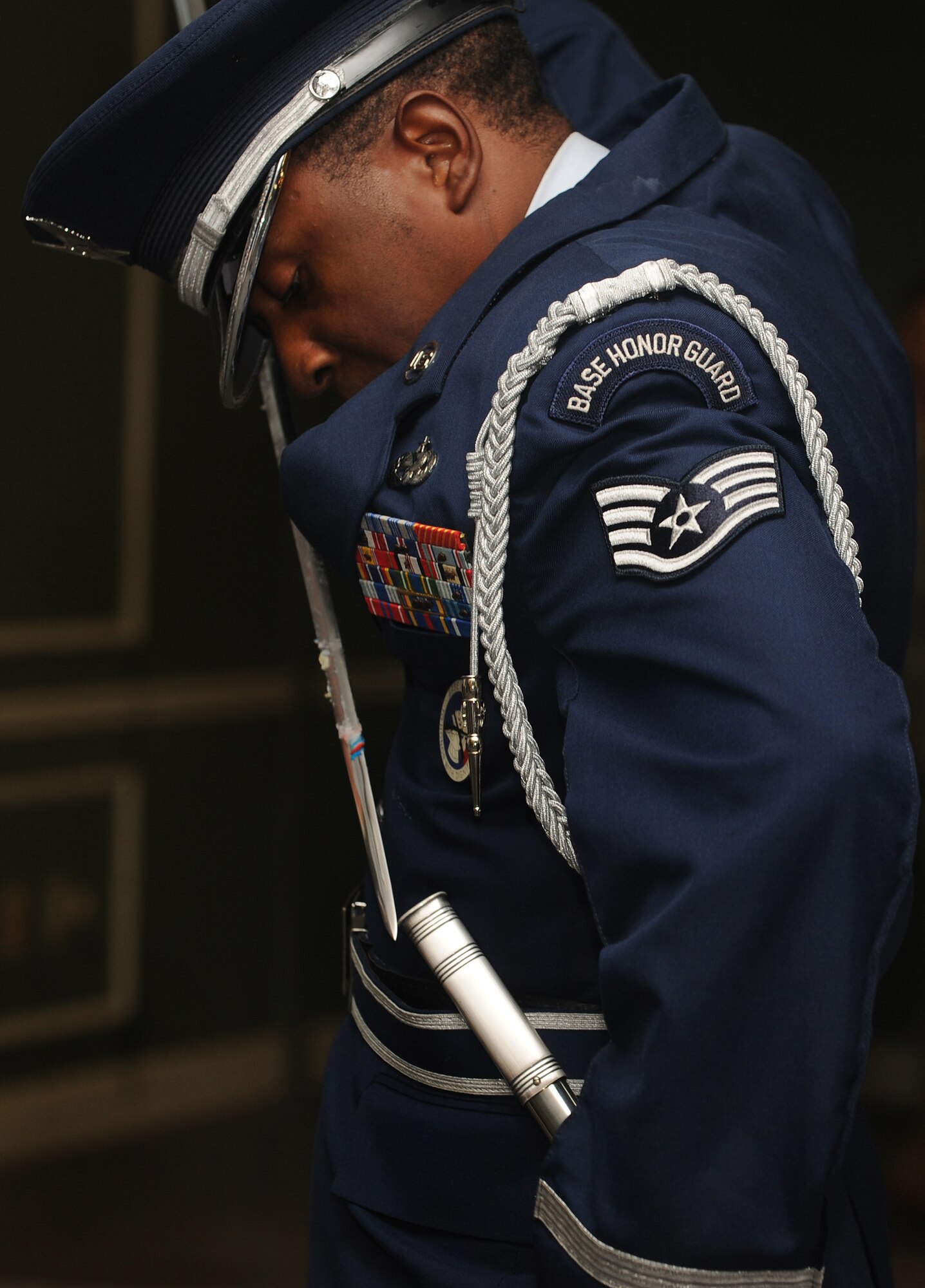 A member of the Shaw Air Force Base Honor Guard puts his sword away after cutting the celebratory birthday cake, Sept. 23, 2011, Shaw Air Force Base, S.C. More than 200 Team Shaw and Sumter area members gathered at the Carolina Skies Club in commemoration of the 70th Anniversary of Shaw Field and the 64th birthday of the Air Force. (U.S. Air Force photo by Airman 1st Class Ashley Gardner/Released)



