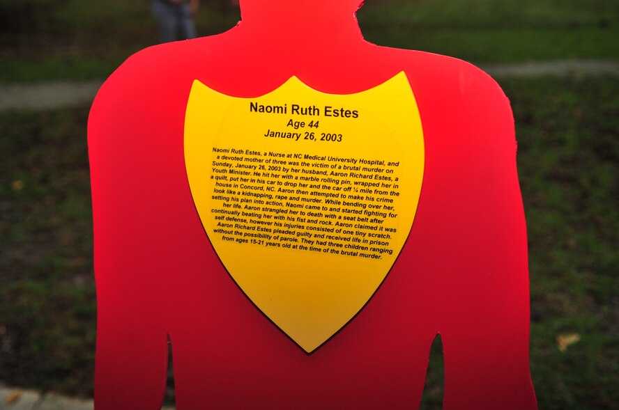 A memorial is displayed at the Wife Appreciation Day 5K run/1K walk at Stoney Creek Park in Goldsboro, N.C., Sept. 24, 2011, in honor of Naomi Ruth Estes, a woman who was murdered by her husband in 2003. Every day in the U.S., three women and one man are murdered by their intimate partner due to domestic violence. The family advocacy program office at Seymour Johnson Air Force Base, N.C., encourages all Airmen to take a stand against domestic violence and seek help if themselves or anyone they know is a victim. (U.S. Air Force photo by Senior Airman Marissa Tucker)