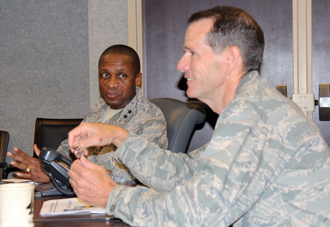 110927-F-NV943-001: Maj. Gen. Darren W. McDew (left), Air Force District of Washington commander, speaks with Lt. Gen. Sid Clarke, Continental U.S. North American Aerospace Defense Command Region-1st Air Force (Air Forces Northern) commander, during his visit to Tyndall Air Force Base, Fla., Sept. 27. McDew visited the Killey Center for Homeland Operations and the 601st Air and Space Operations Center during his familiarization tour, receiving mission briefings and watching demonstrations of CONR’s capabilities. (U.S. Air Force photo by Angela Pope) 