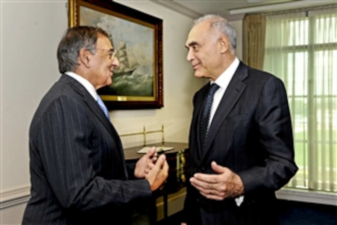 U.S. Defense Secretary Leon E. Panetta talks informally with Egyptian Foreign Minister Mohamed Kamel Amr at the Pentagon, Sept. 28, 2011. The two men held security talks with some of their senior policy advisors.