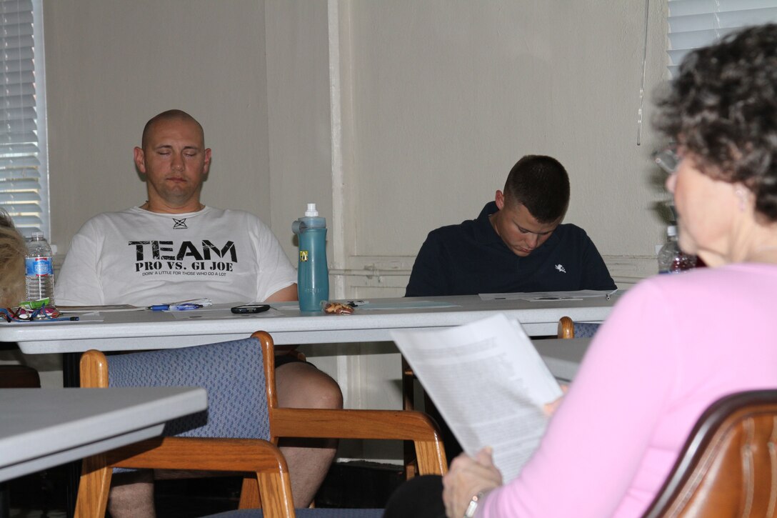 Linda Stark a certified clinical hypnotherapist, reads to a stress hypnotherapy class Sept. 28 aboard Marine Corps Recruit Depot San Diego to help people find calmness. The two-hour class provided tools necessary to live a more enjoyable, stress-free life. First participants had to address and identify their stressors. Then Stark talked them through hypnotherapy which was intended to make the participants feel refreshed and calmn.