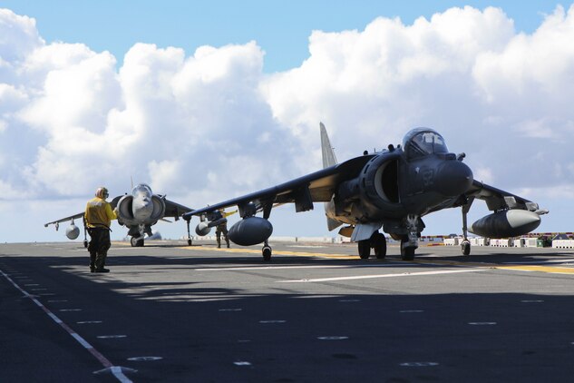 AV-8B Harriers with Marine Attack Squadron 214, 31st Marine Expeditionary Unit, taxi down the flight deck aboard USS Essex, Sept. 29. The VMA was conducting this training in preparation for the MEU's Certification Exercise. The 31st MEU is the only continuously forward-deployed MEU and remains the nation’s force in readiness in the Asia-Pacific region.