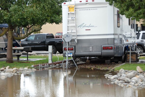 "Lake March" fills the road behind motor homes at the family camp at March Air Reserve Base, Calif., Jan. 22, 2010. One of the goals of the repaving project that began in September 2011, is to keep the camp dry during the rainy season. (U.S. Air Force photo/Henry Kim) 