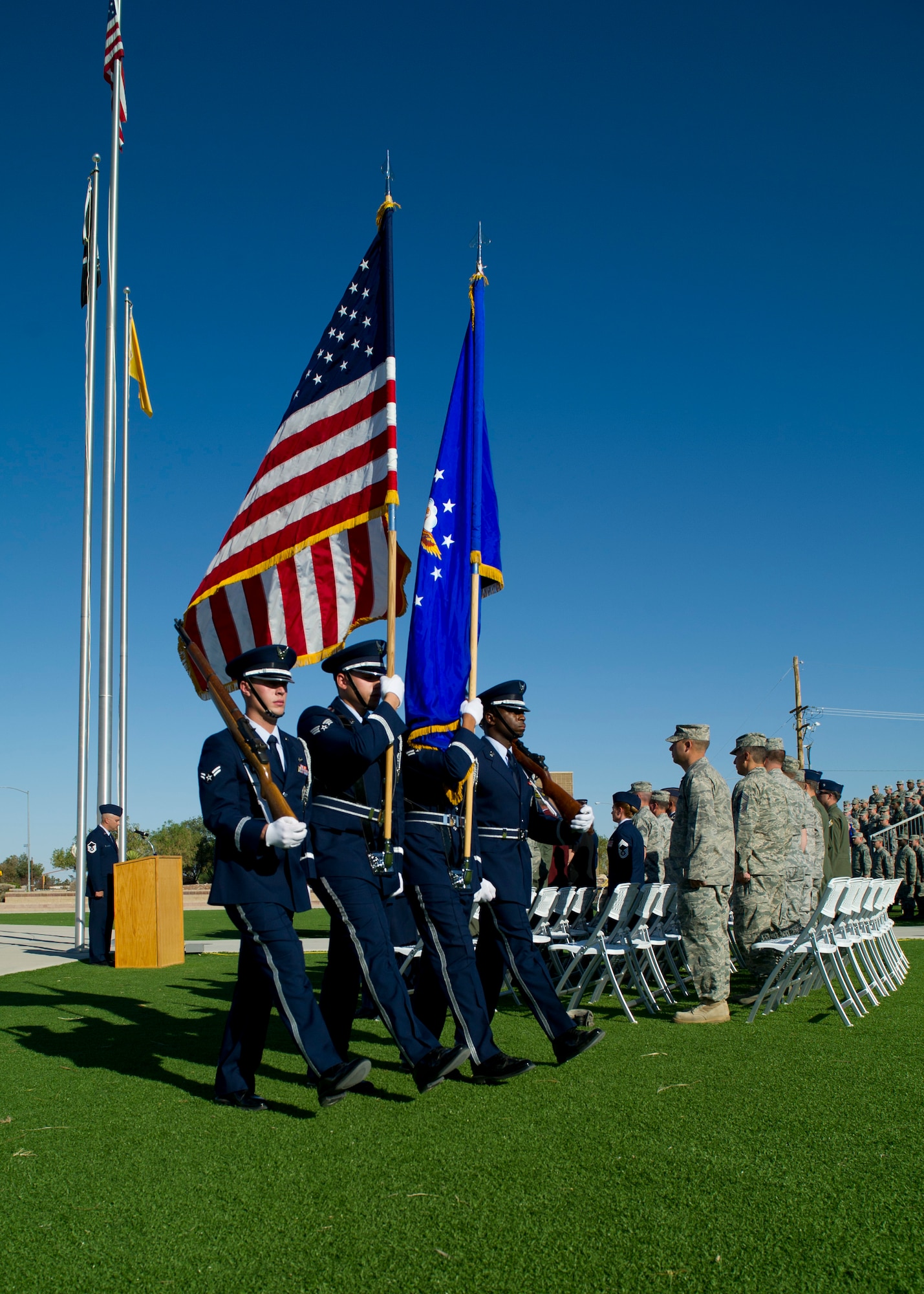 HOLLOMAN AIR FORCE BASE, N.M. -- Members of the 49th Wing Steel Talons Honor Guard retreat after posting the colors for the 2011 Prisoners of War/ Missing in Action Recognition Day Ceremony Sept. 29, 2011, at Heritage Park. Observances of National POW/MIA Recognition Day are held across the country on military installations ships at sea, state capitols, schools and veteran facilities. (U.S. Air Force photo by Senior Airman John D. Strong II/ Released)