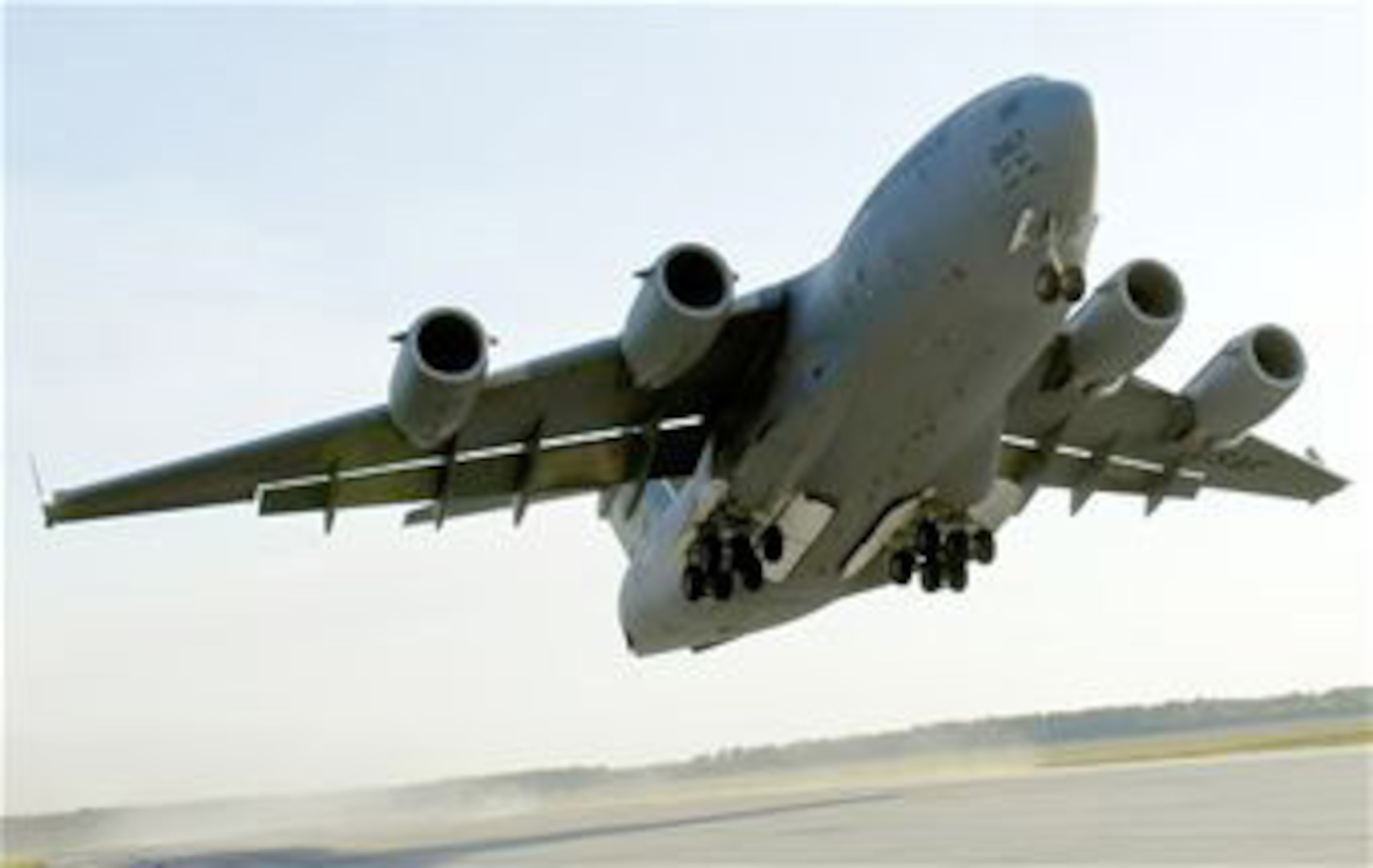 In the interest of energy security, AMC is helping to reduce dependence on foreign sources by preparing for the use of alternative aviation fuels.  Variants of our C-17s, C-5s, KC-135s and C-130s are fully certified for unrestricted operations using a synthetic blend of JP-8.  A C-17 Globemaster III, like the one shown here, flew a test mission Aug. 27, 2010, using jet fuel blended with a combination of JP-8, biofuel and synthetic fuel. (U. S. Air Force photo/Staff Sgt. Brian Ferguson) 