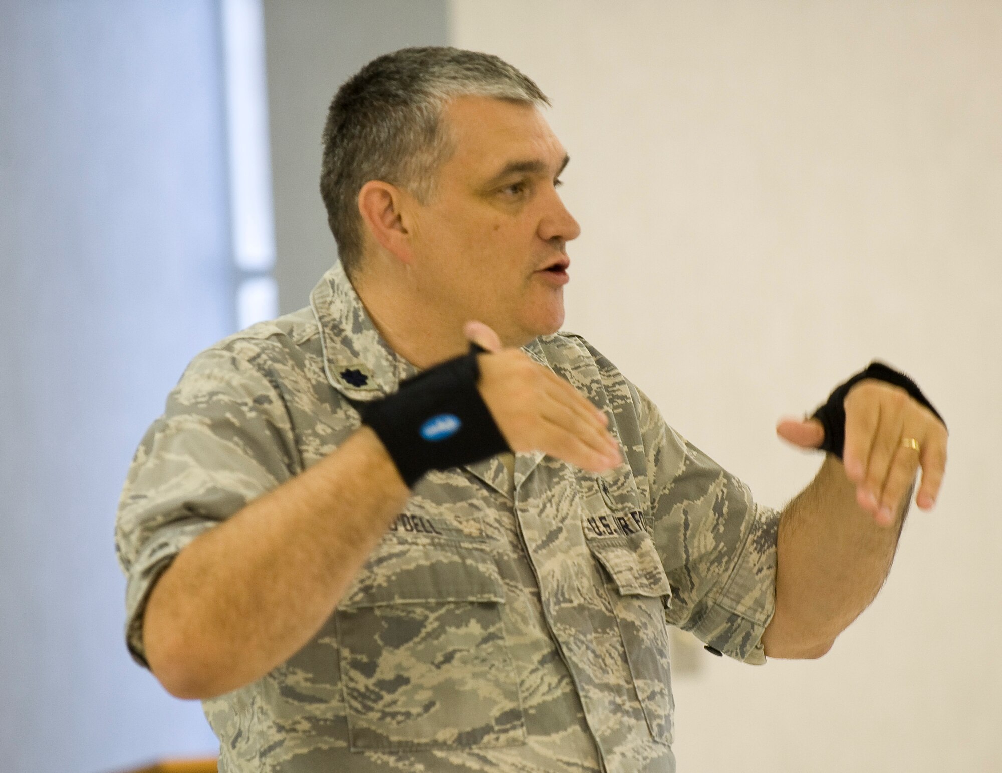 Lt. Col. Robert Odell, 2nd Bomb Wing chaplain, briefs Airmen during a Wingman Intervention Day event at the Chapel 2 annex on Barksdale Air Force Base, La., Sept. 27. Wingman Day is an Air Force event to help build the concept of Airmen helping Airmen in times of need, as well as helping to build a rapport with one another. (U.S. Air Force photo/Senior Airman Chad Warren)(RELEASED)