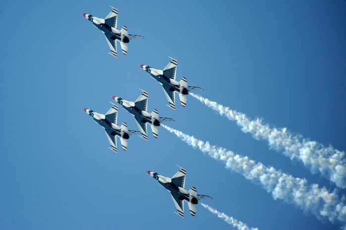 The U.S. Air Force Air Demonstration Squadron "Thunderbirds" perform the Five Card Loop during the Cleveland National Air Show, Sept. 3, 2011.(U.S. Air Force photo/Staff Sgt. Larry E. Reid Jr., Released)