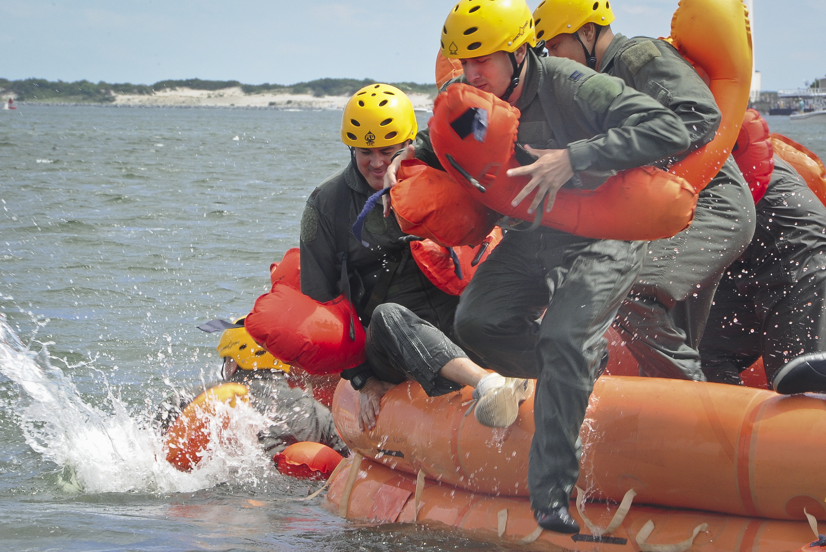 Photos Air Force, Coast Guard perform water survival training > Air