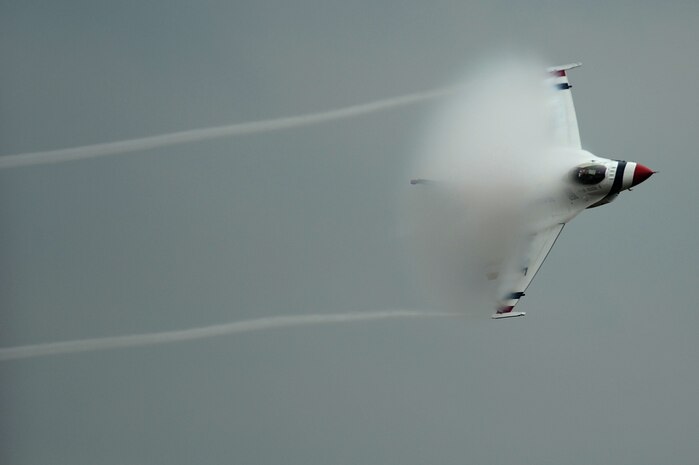 Maj. J.R. Williams, Thunderbird 6, Opposing Solo, demonstrates the tactical surprise of the F-16 Fighting Falcon with a Sneak Pass during the Boston Portsmouth Air Show at Pease Air National Guard Base, N.H., Aug. 14, 2011.
(U.S. Air Force photo/Staff Sgt. Larry E. Reid Jr., Released)