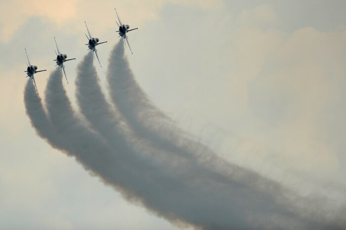 The U.S. Air Force Air Demonstration Squadron "Thunderbirds", approach in trail formation for the Trail-to-Diamond Bottom-Up Pass during the Milwaukee Air and Water show at Bradford Beach, Wisconsin, Aug. 7, 2011.
(U.S. Air Force photo/Staff Sgt. Larry E. Reid Jr., Released)
