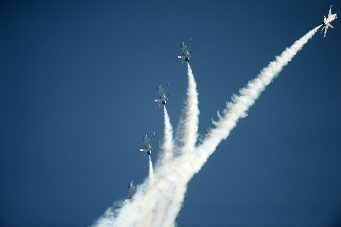 The U.S. Air Force Air Demonstration Squadron "Thunderbirds" perform the Line Abreast Loop during the Milwaukee Air and Water show at Bradford Beach, Wisconsin, Aug. 6, 2011.
(U.S. Air Force photo/Staff Sgt. Larry E. Reid Jr., Released)