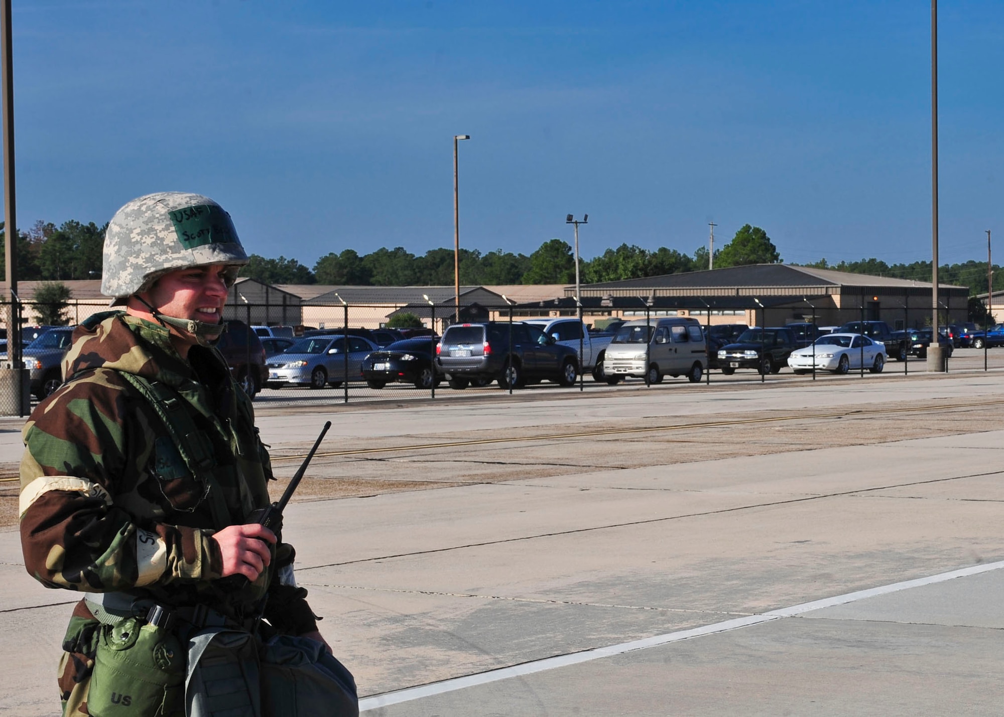 U.S. Air Force Tech. Sgt. Scott Beckham, 23rd Civil Engineer Squadron station chief, praises his Airmen for accomplishing the mission at the conclusion of a fire scenario during a phase II operational readiness exercise at Moody Air Force Base, Ga., Sept. 29, 2011. During the scenario, Beckham acted as the assistant chief of operations and was able to witness how his firefighters responded to a simulated burning building. (U.S. Air Force photo by Senior Airman Stephanie Mancha/Released) 