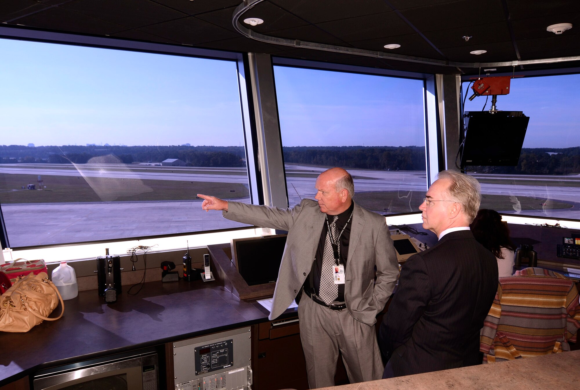 Clarence Miller, Airfield Operations Manager here, conducts tour with Congressman Tom Price of the recently constructed Dobbins air traffic control tower during his visit Sept. 29. Miller emphasized the enhanced capabilities and features of the new tower, a structure not previously availbale for viewing during Price's last visit to Dobbins.  (U.S. Air Force photo/ Brad Fallin)