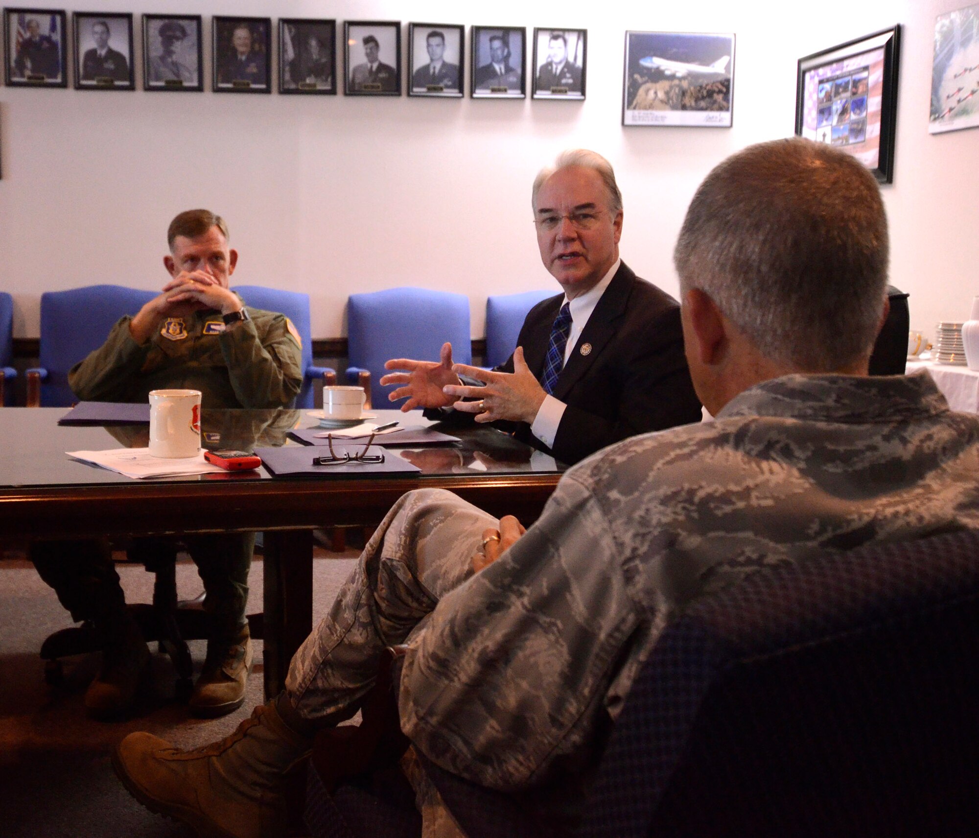 Congressman Tom Price (center), the representative for Georgia's 6th Congressional District, discusses the 94th airlift wing's mission, strength in reserves and contribution to maintaing a strong defense system with Col. Tim Tarchick, wing commander here Sept. 29th. The visit also included a tour of the newly constructed air traffic control tower and fitness facilities here.  (U.S. Air Force photo/ Brad Fallin)