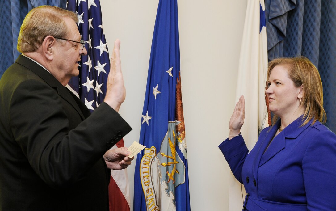 Erin C. Conaton takes her oath of office March 15, 2010, as the new undersecretary of the Air Force during a ceremony in the Pentagon officiated by William Davidson, the administrative assistant to the secretary of the Air Force.(U.S. Air Force photo/Scott M. Ash)