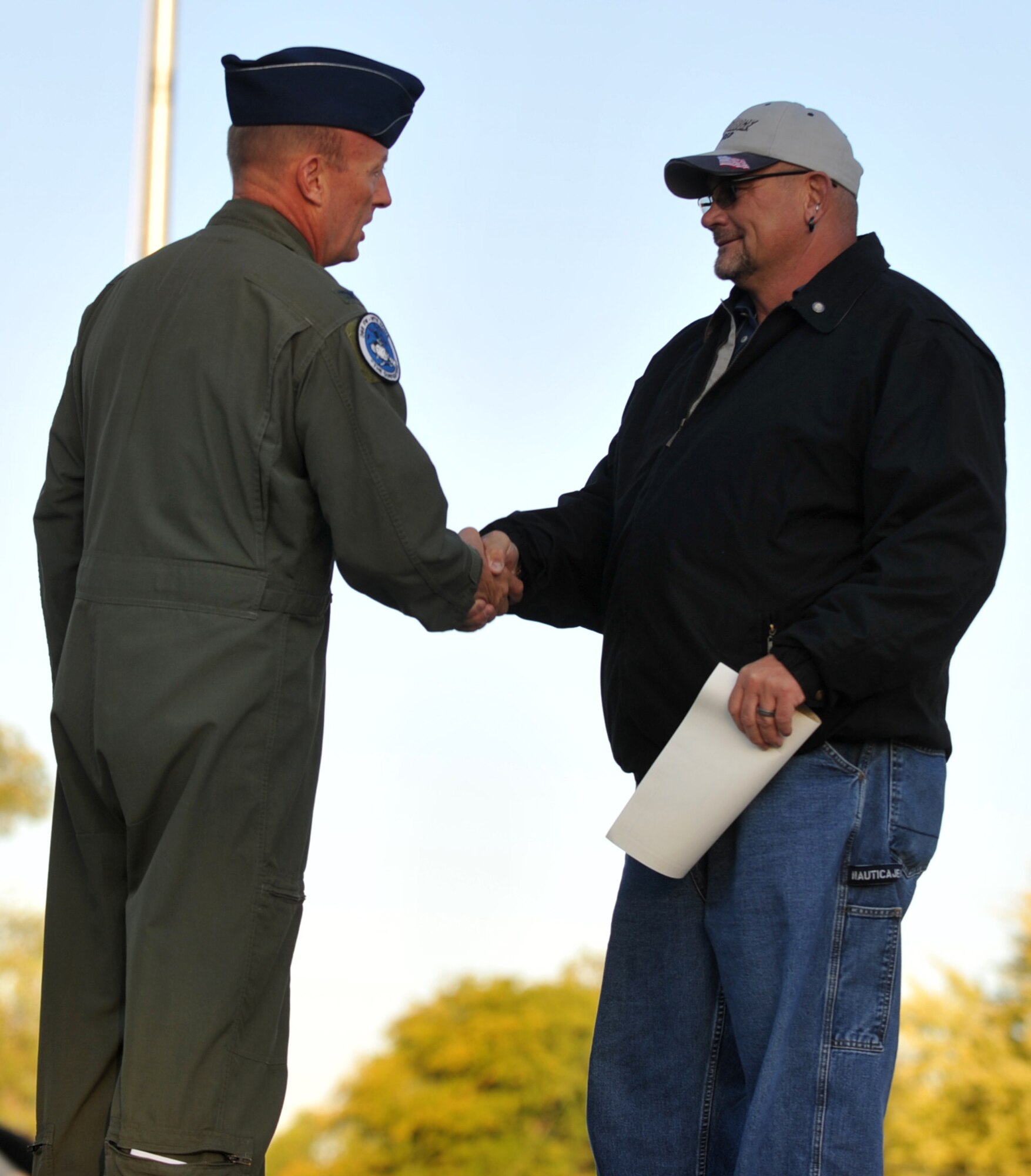 Bob Mann, 366th Civil Engineering Squadron, receives the wingman of the year award Sept. 23, 2011 at Mountain Home Air Force Base, Idaho. By chance, Mann noticed a grandfather having trouble breathing who was with his two grandchildren near the side of the street. Mann called 911 and looked after the children until their father could be located. (U.S. Air Force photo by Airman 1st Class Heather Hayward)